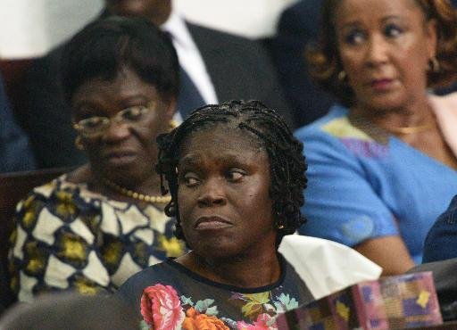 Simone Gbagbo, ancienne Première dame de Côte d'Ivoire, à l'ouverture de son procès pour atteinte à la sûreté de l'Etat, à Abidjan le 26 décembre 2014 | AFP/Archives | Sia Kambou - See more at: http://www.izf.net/afp/c-te-divoire-renvoi-proc-s-simone-gbagbo-reprise-dialogue-politique#sthash.KU5QaqSo.dpuf